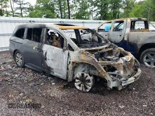 2014 Honda Odyssey EX-L with VIN 5FNRL5H66EB004583, listed as a Copart auction lot 57973685 with Not provided miles and Salvage title. Bid and sale history available at DreamBid. Image 4.