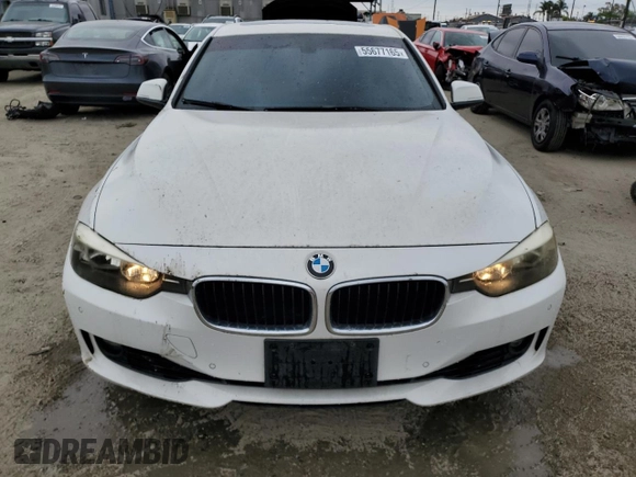 2013 BMW 3 Series 328i with VIN WBA3A5G57DNP23598, listed as a Copart auction lot 55677165 with 217,977 mi miles and Clean Title. Bid and sale history available at DreamBid. Image 5.