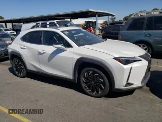 2024 Lexus UX with VIN JTHX6JBH3R2187983, listed as a Copart auction lot 73429324 with 14,549 mi miles and Salvage Title. Bid and sale history available at carsss.com. Image 4.