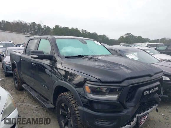 2019 Ram 1500 Rebel with VIN 1C6SRFLTXKN580782, listed as a IAAI auction lot 41498027 with 83,669 mi miles and . Bid and sale history available at DreamBid. Image 12.