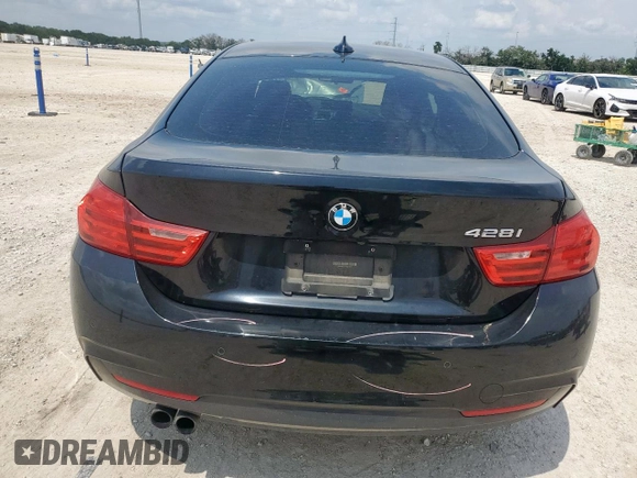 2015 BMW 4 Series 428i z VIN WBA4A5C54FG051212, wystawiony jako Copart lot #59479495 z przebiegiem 126 497 mil mil oraz Szkoda całkowita • Salvage title. Historia ofert i sprzedaży dostępna na DreamBid. Obrazek 6.