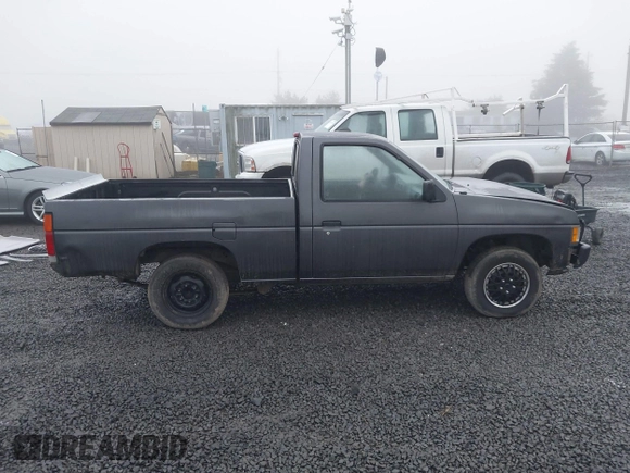 1997 Nissan Frontier XE with VIN 1N6SD11S7VC319806, listed as a IAAI auction lot 41349741 with 215,812 mi miles and . Bid and sale history available at DreamBid. Image 14.