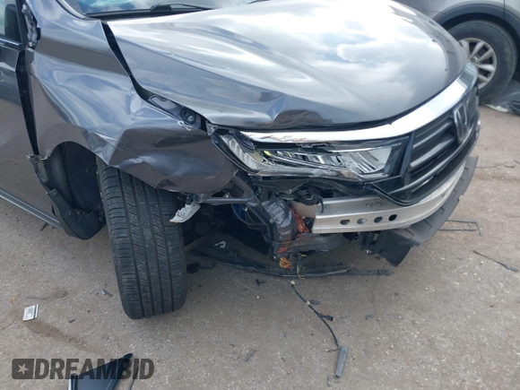 2022 Honda Odyssey Touring with VIN 5FNRL6H80NB023623, listed as a IAAI auction lot 41512586 with 63,329 mi miles and . Bid and sale history available at DreamBid. Image 6.