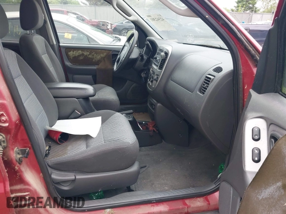 2003 Ford Escape XLT Popular 2 with VIN 1FMYU93153KB78622, listed as a IAAI auction lot 42342301 with Not provided miles and . Bid and sale history available at DreamBid. Image 5.