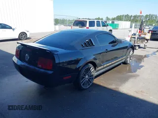 2005 Ford Mustang Deluxe with VIN 1ZVFT80N455122217, listed as a IAAI auction lot 42015083 with 154,396 mi miles. Bid and sale history available at carsss.com. Image 4.