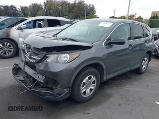 2014 Honda CR-V LX with VIN 3CZRM3H32EG715290, listed as a IAAI auction lot 42178372 with 90,934 mi miles and . Bid and sale history available at carsss.com. Image 2.
