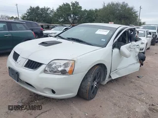 2004 Mitsubishi Galant ES with VIN 4A3AB36F44E117470, listed as a IAAI auction lot 41213968 with 128,082 mi miles. Bid and sale history available at carsss.com. Image 2.