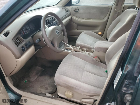 2001 Mazda 626 LX with VIN 1YVGF22C215245817, listed as a Copart auction lot 80491144 with 147,603 mi miles and Salvage Title. Bid and sale history available at carsss.com. Image 7.