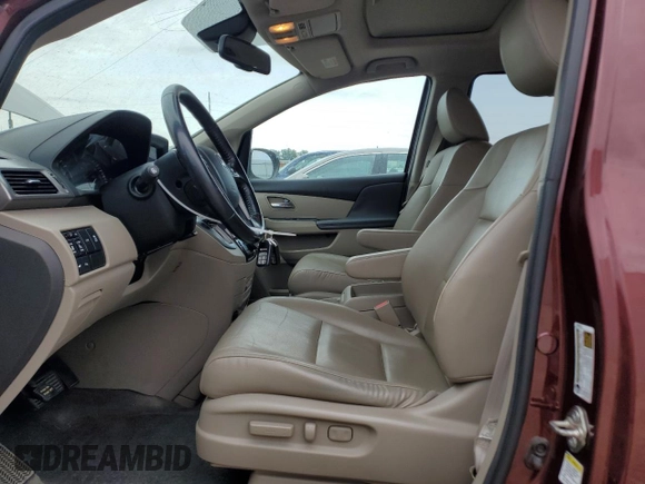 2016 Honda Odyssey Touring Elite with VIN 5FNRL5H9XGB109463, listed as a Copart auction lot 57483225 with 182,450 mi miles and Salvage title. Bid and sale history available at DreamBid. Image 7.