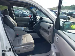 2013 Honda Pilot EX-L with VIN 5FNYF4H63DB077552, listed as a IAAI auction lot 42483801 with 218,823 mi miles and . Bid and sale history available at DreamBid. Image 5.