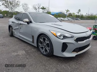 2021 Kia Stinger GT-Line with VIN KNAE15LA6M6091313, listed as a IAAI auction lot 41409011 with 34,356 mi miles. Bid and sale history available at carsss.com. Image 1.