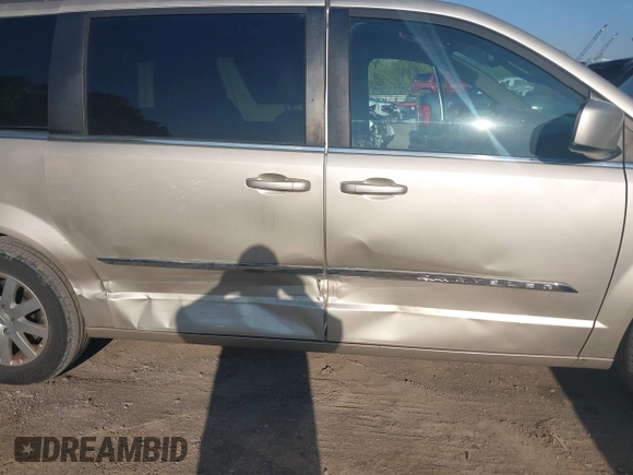 2014 Chrysler Town & Country Touring with VIN 2C4RC1BG7ER277126, listed as a IAAI auction lot 42072934 with 81,307 mi miles and . Bid and sale history available at DreamBid. Image 6.