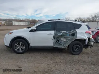 2018 Toyota RAV4 XLE with VIN 2T3RFREV2JW777906, listed as a IAAI auction lot 41164038 with 89,049 mi miles. Bid and sale history available at carsss.com. Image 15.