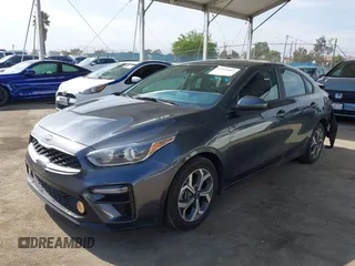 2021 Kia Forte FE with VIN 3KPF24AD6ME387387, listed as a IAAI auction lot 42034607 with 28,554 mi miles and . Bid and sale history available at carsss.com. Image 2.