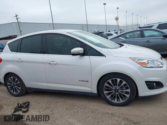2018 Ford C-Max Titanium with VIN 1FADP5DUXJL104279, listed as a IAAI auction lot 41882275 with 55,137 mi miles and . Bid and sale history available at DreamBid. Image 13.