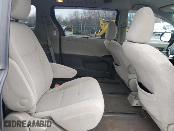 2017 Toyota Sienna LE with VIN 5TDJZ3DC8HS149992, listed as a Copart auction lot 51878725 with 90,299 mi miles and Salvage title. Bid and sale history available at DreamBid. Image 11.