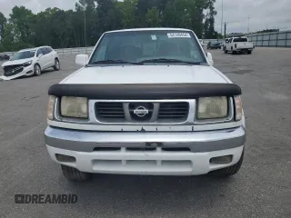 2000 Nissan Frontier XE with VIN 1N6ED27Y6YC334154, listed as a Copart auction lot 54140454 with 330,552 mi miles and Salvage title. Bid and sale history available at DreamBid. Image 5.