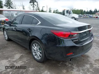 2016 Mazda 6 i Sport with VIN JM1GJ1U53G1451578, listed as a IAAI auction lot 42134810 with 113,144 mi miles and . Bid and sale history available at DreamBid. Image 3.