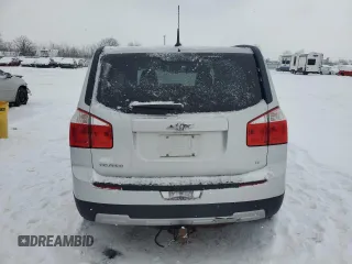2014 Chevrolet Orlando z VIN KL77P2EK4EK507427, wystawiony jako Copart lot #87641825 z przebiegiem 138 625 mil mil oraz Tytuł czysty. Historia ofert i sprzedaży dostępna na DreamBid. Obrazek 6.
