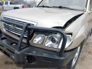 1999 Lexus LX 470 z VIN JT6HT00W8X0045705, wystawiony jako IAAI lot #42005587 z przebiegiem 443 758 mil mil oraz . Historia ofert i sprzedaży dostępna na DreamBid. Obrazek 6.