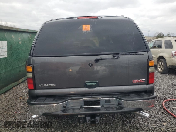 2005 GMC Yukon SLT z VIN 1GKEC13T35J119126, wystawiony jako Copart lot #47849455 z przebiegiem 301 785 mil mil oraz Szkoda całkowita • Salvage title. Historia ofert i sprzedaży dostępna na DreamBid. Obrazek 6.