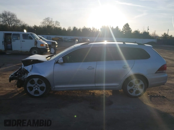 2012 Volkswagen Jetta SportWagen TDI w/Sunroof with VIN 3VWPL7AJ0CM700623, listed as a IAAI auction lot 41758049 with 126,199 mi miles. Bid and sale history available at carsss.com. Image 14.