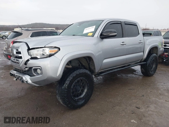 2018 Toyota Tacoma SR with VIN 5TFGZ5AN4JX142565, listed as a IAAI auction lot 41353718 with 87,544 mi miles and . Bid and sale history available at carsss.com. Image 17.