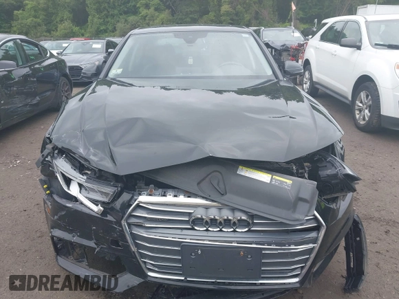2017 Audi A4 Premium Plus z VIN WAUENAF42HN040468, wystawiony jako IAAI lot #42535328 z przebiegiem 104 189 mil mil oraz . Historia ofert i sprzedaży dostępna na DreamBid. Obrazek 12.