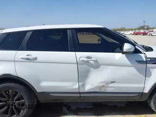 2015 Land Rover Range Rover Evoque Pure with VIN SALVN2BG2FH073984, listed as a IAAI auction lot 41820047 with 75,318 mi miles. Bid and sale history available at carsss.com. Image 14.