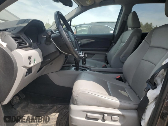 2017 Honda Pilot EX-L z VIN 5FNYF6H61HB061139, wystawiony jako Copart lot #55593095 z przebiegiem 107 170 mil mil oraz Szkoda całkowita • Salvage title. Historia ofert i sprzedaży dostępna na DreamBid. Obrazek 7.