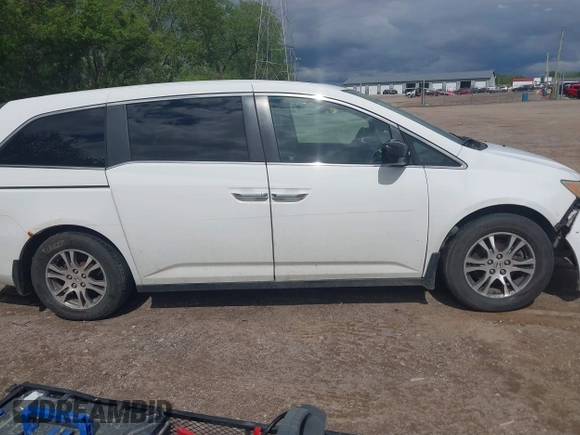 2012 Honda Odyssey EX-L with VIN 5FNRL5H63CB117341, listed as a IAAI auction lot 42197815 with 256,544 mi miles and . Bid and sale history available at DreamBid. Image 13.