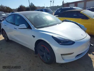 2023 Tesla Model 3 with VIN 5YJ3E1EAXPF570038, listed as a IAAI auction lot 41654937 with 16,374 mi miles. Bid and sale history available at carsss.com. Image 1.