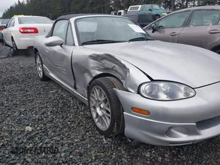 2002 Mazda MX-5 Miata Cloth z VIN JM1NB353620221304, wystawiony jako IAAI lot #41178747 z przebiegiem 98 958 mil mil oraz . Historia ofert i sprzedaży dostępna na DreamBid. Obrazek 6.