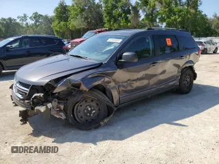2017 Dodge Journey American Value with VIN 3C4PDCAB6HT621987, listed as a Copart auction lot 52559305 with 169,468 mi miles and Salvage Title. Bid and sale history available at DreamBid. Image 1.