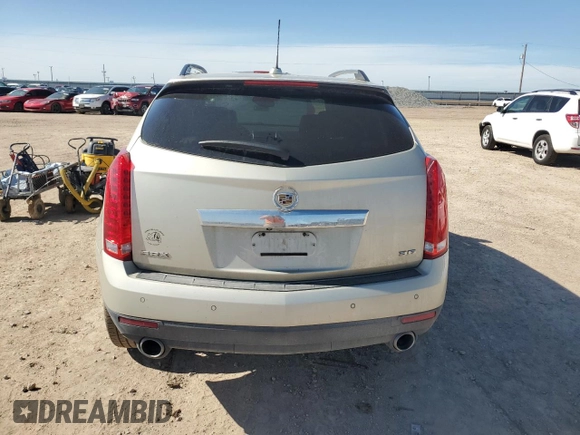 2015 Cadillac SRX Premium Collection with VIN 3GYFNDE32FS536692, listed as a Copart auction lot 54669175 with 80,484 mi miles and Salvage title. Bid and sale history available at DreamBid. Image 6.