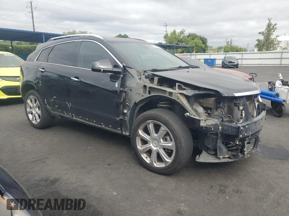 2013 Cadillac SRX Performance Collection with VIN 3GYFNDE33DS555717, listed as a Copart auction lot 53308195 with 125,528 mi miles and Salvage Title. Bid and sale history available at carsss.com. Image 4.
