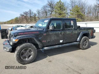 2020 Jeep Gladiator Rubicon z VIN 1C6JJTBG3LL112251, wystawiony jako Copart lot #54123125 z przebiegiem Nie podano mil oraz Szkoda całkowita • Salvage title. Historia ofert i sprzedaży dostępna na DreamBid. Obrazek 1.