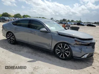 2024 Honda Accord Touring with VIN 1HGCY2F88RA036672, listed as a Copart auction lot 58369875 with 8,898 mi miles and Salvage title. Bid and sale history available at DreamBid. Image 4.