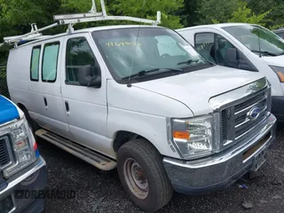 2014 Ford Econoline Cargo Commercial with VIN 1FTNE2EW4EDA31719, listed as a IAAI auction lot 42627027 with 223,677 mi miles and . Bid and sale history available at DreamBid. Image 1.