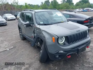 2021 Jeep Renegade Trailhawk with VIN ZACNJDC12MPM56979, listed as a IAAI auction lot 42438891 with 66,926 mi miles and . Bid and sale history available at DreamBid. Image 1.