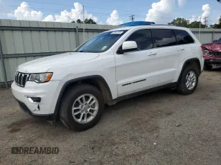 2018 Jeep Grand Cherokee Laredo E z VIN 1C4RJEAG0JC131491, wystawiony jako Copart lot #63947245 z przebiegiem 204 788 mil mil oraz Czysty tytuł • Clean title. Historia ofert i sprzedaży dostępna na DreamBid. Obrazek 1.