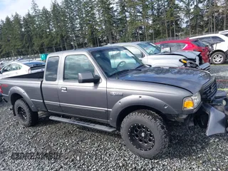 2009 Ford Ranger XLT with VIN 1FTYR44E89PA56696, listed as a IAAI auction lot 41939544 with 144,747 mi miles. Bid and sale history available at carsss.com. Image 13.