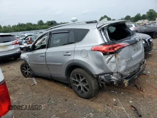 2018 Toyota RAV4 Hybrid SE with VIN JTMJJREV6JD238570, listed as a Copart auction lot 63972534 with Not provided miles and Salvage title. Bid and sale history available at DreamBid. Image 2.
