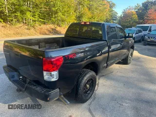 2010 Toyota Tundra 4WD Truck with VIN 5TFUY5F14AX106337, listed as a Copart auction lot 75692084 with 106,050 mi miles and Clean Title. Bid and sale history available at carsss.com. Image 4.