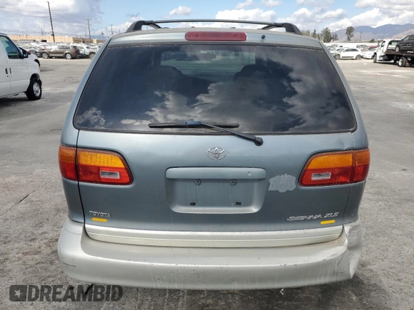 1999 Toyota Sienna LE with VIN 4T3ZF13C6XU128055, listed as a Copart auction lot 81100934 with 0 mi miles and Salvage Title. Bid and sale history available at carsss.com. Image 6.