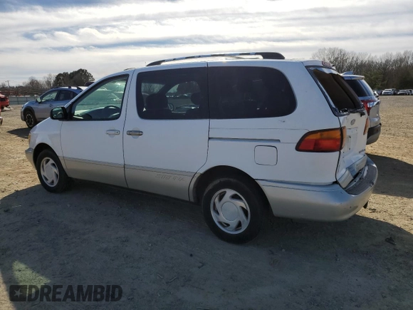 1999 Toyota Sienna LE with VIN 4T3ZF13C0XU144476, listed as a Copart auction lot 48185235 with 183,940 mi miles and Salvage title. Bid and sale history available at DreamBid. Image 2.