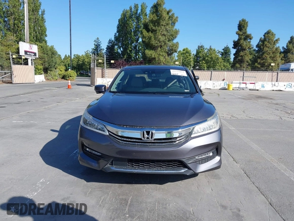 2017 Honda Accord Touring with VIN 1HGCR3F97HA030310, listed as a IAAI auction lot 42539852 with 64,849 mi miles and . Bid and sale history available at DreamBid. Image 12.