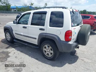 2004 Jeep Liberty Sport with VIN 1J4GK48K54W153217, listed as a IAAI auction lot 42071897 with 106,921 mi miles and . Bid and sale history available at carsss.com. Image 3.