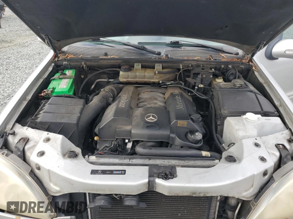 2005 Mercedes-Benz M 500 z VIN 4JGAB75E35A532559, wystawiony jako Copart lot #85321484 z przebiegiem 305 999 mil mil oraz Szkoda całkowita • Salvage title. Historia ofert i sprzedaży dostępna na DreamBid. Obrazek 14.