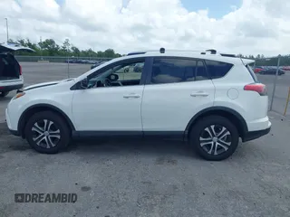 2016 Toyota RAV4 LE with VIN JTMZFREV2GJ096782, listed as a IAAI auction lot 41945319 with 76,866 mi miles. Bid and sale history available at carsss.com. Image 15.